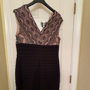 NWT beautiful laced nude top and black ribbed bottom dress. Size 14.